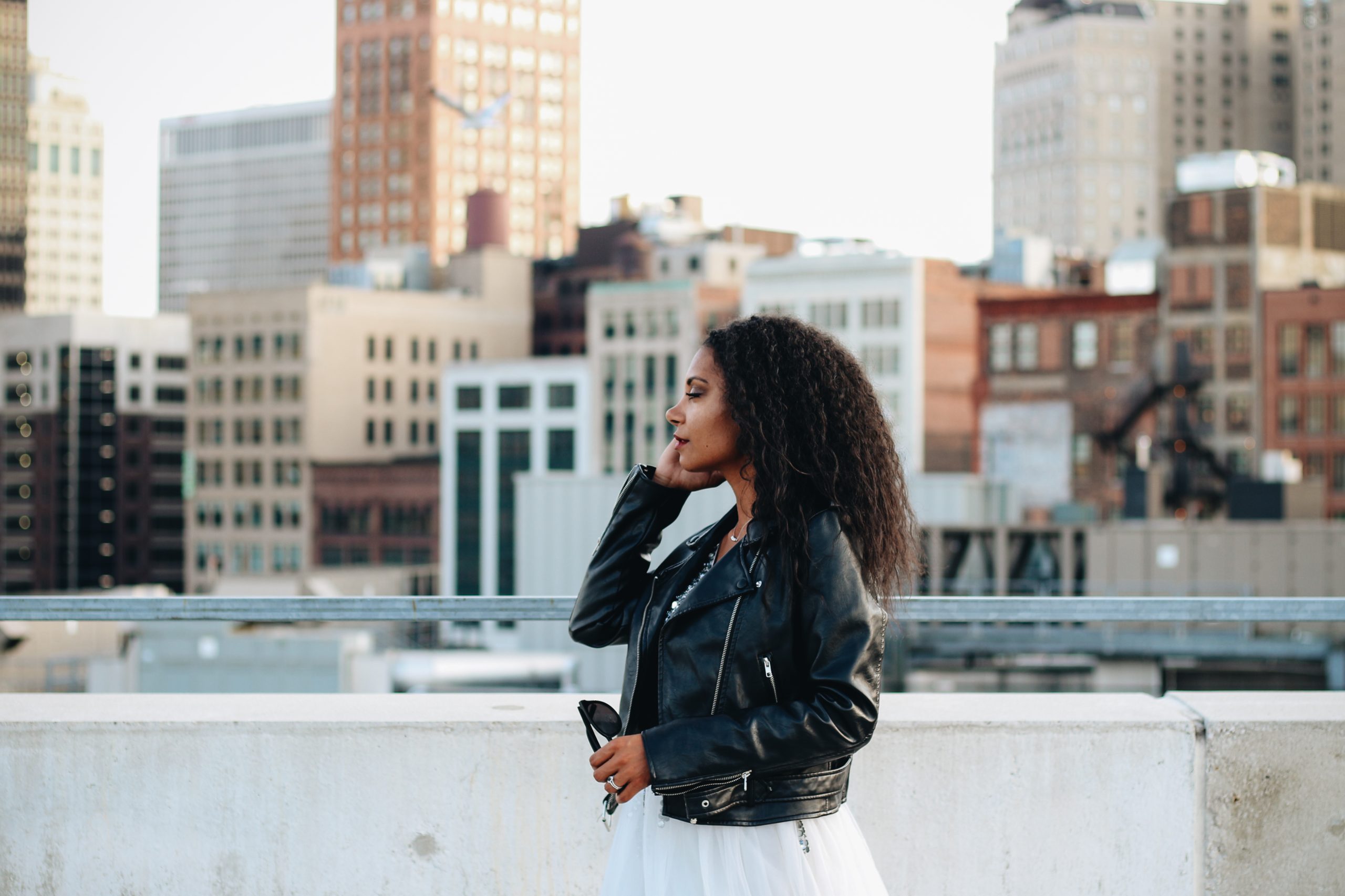 Detroit Bride with rocker style in the city via Chettara T. Photography on a parking garage roof.